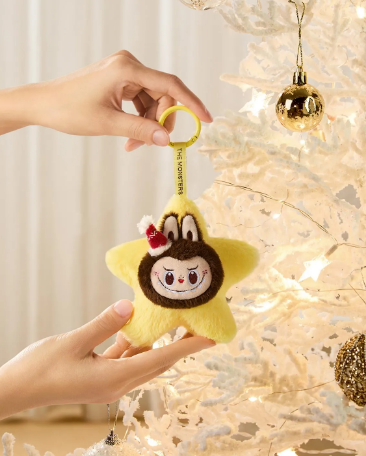 POP MART blind box collectibles yellow star keychain with a cute character hanging on a Christmas tree