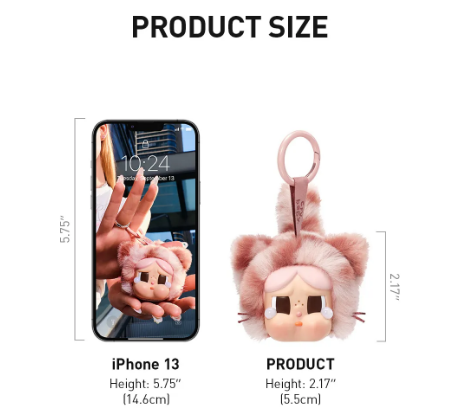POP MART CRYBABY blind box pendant with pink furry cat design shown next to iPhone 13 for size comparison