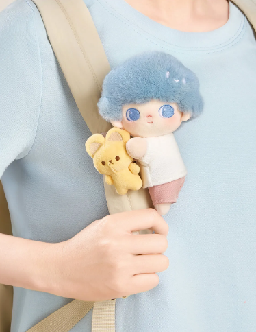 POP MART Dimoo Cloud Companion series figurine with blue hair and yellow bear plush attached to backpack strap