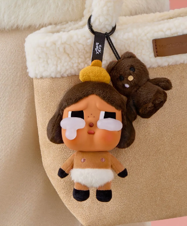 POP MART keychain featuring a crying character and teddy bear plush from authentic blind box collectibles Canada