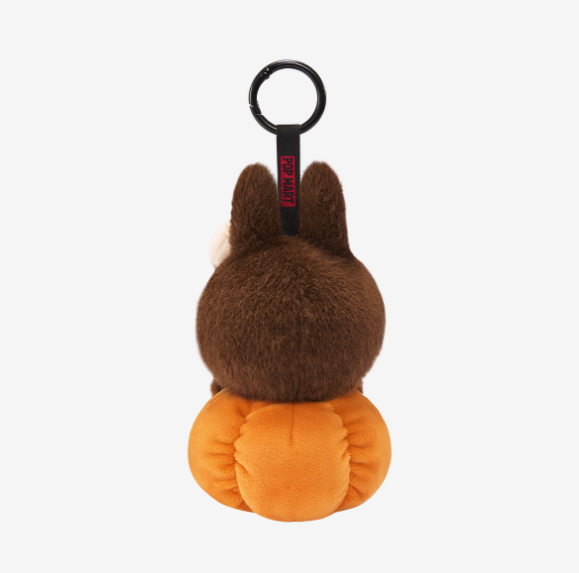 POP MART plush keychain featuring authentic Labubu collectibles with soft brown and orange design