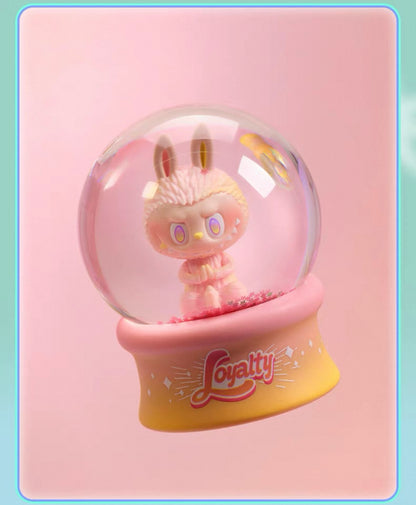 POP MART Labubu crystal ball preorder featuring a pink bunny figure inside a clear globe with loyalty text on base
